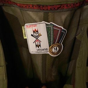 Burton mens snowboard pants. They have been worn and have a little fray. Green